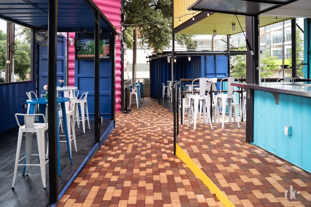Outdoor restaurant made of colorful shipping containers at our Dallas hotel