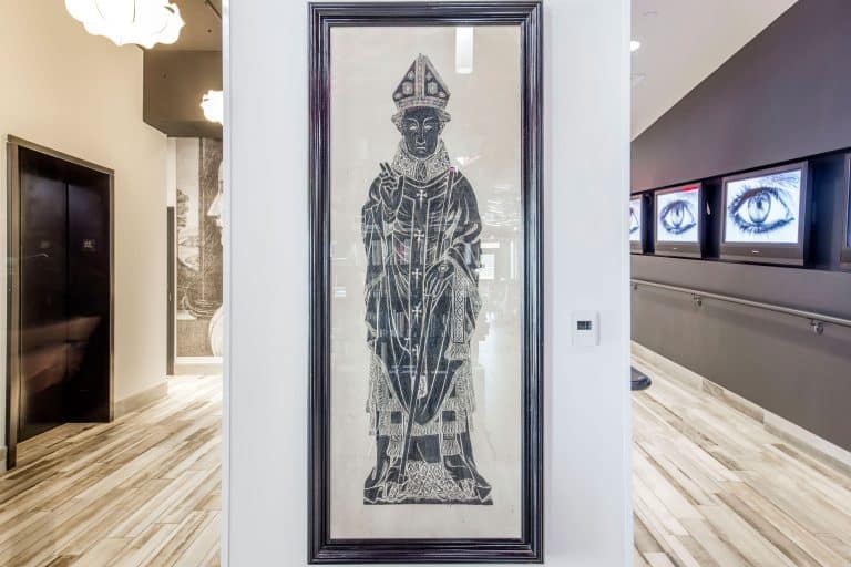 Local Dallas art of a religious figure, on display at our boutique hotel in Dallas