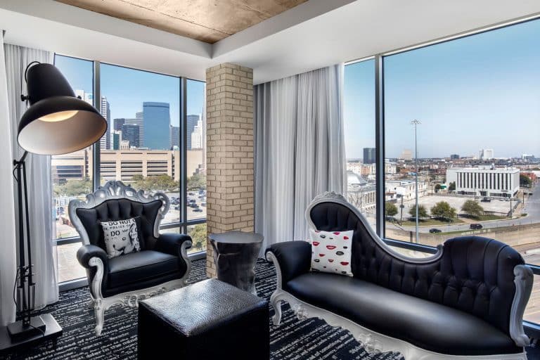 Corner suite sitting area with Downtown Dallas view