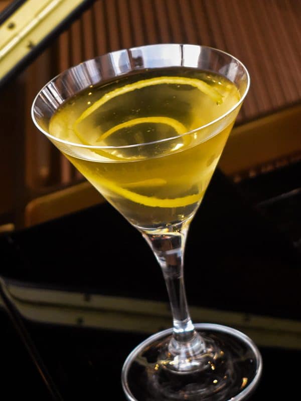 Lemon rind in a yellow martini at our boutique hotel in Dallas, TX