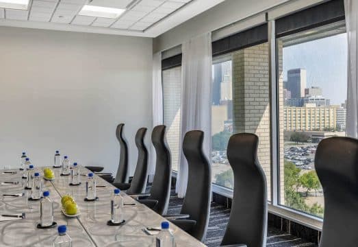 Conference table in a Dallas event venue overlooking downtown