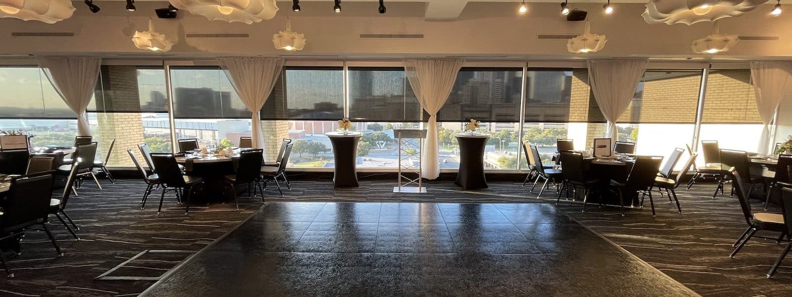 Tables and a dance floor in the Skye Ballroom, our Dallas event venue