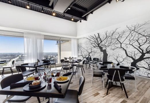 Toast meeting room tables and tree mural