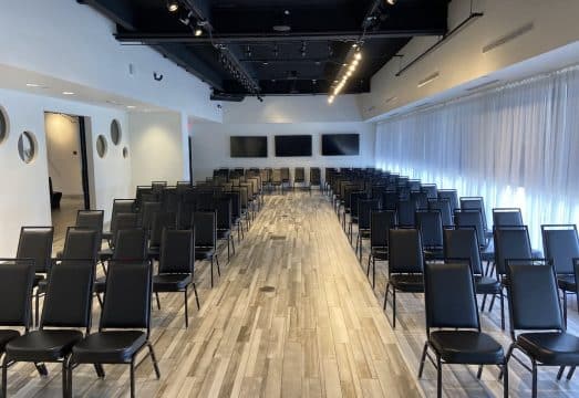Event space in Dallas set up with chairs for a presentation